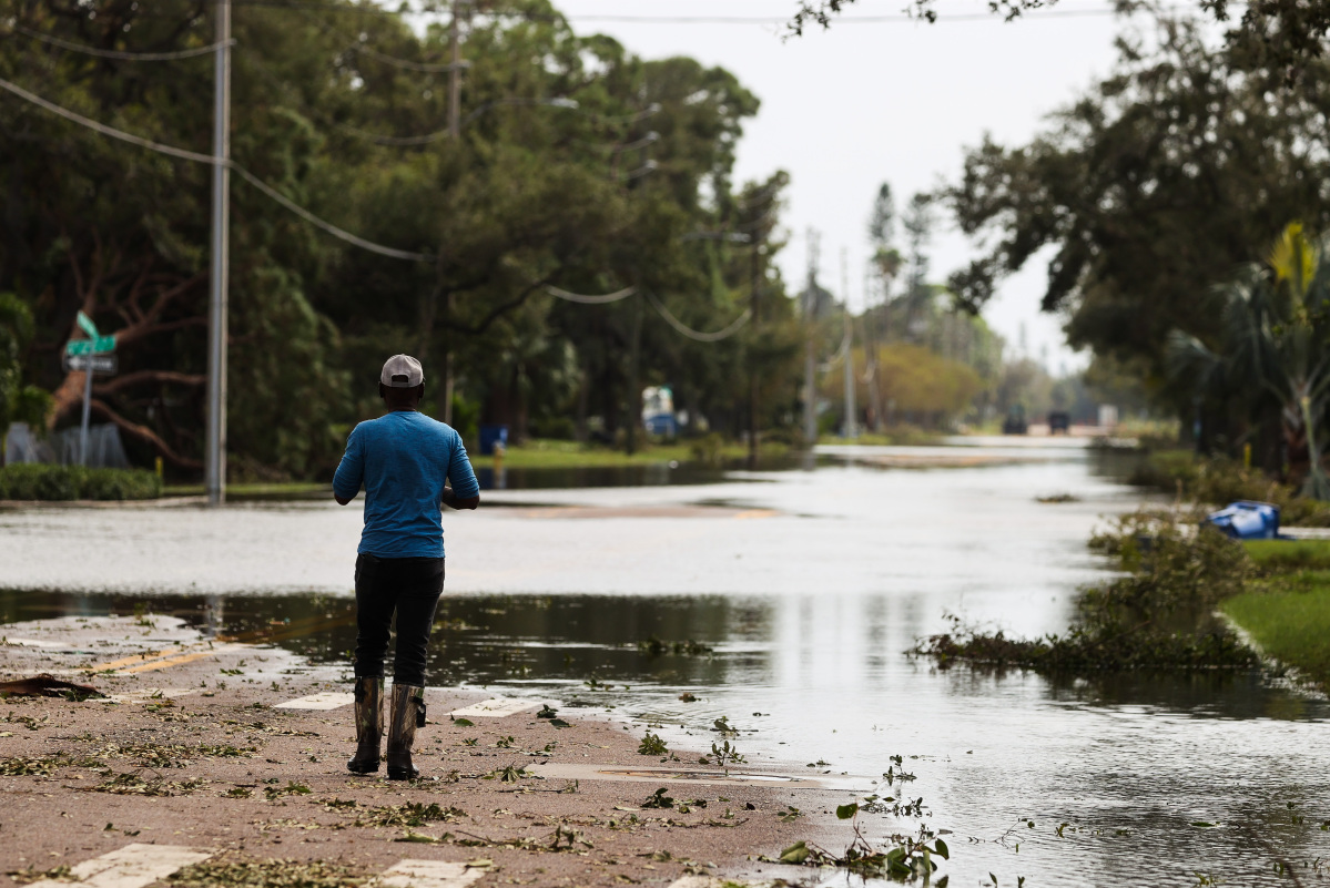 dirk shadd times a pedestrian checks out the conditions on dr martin